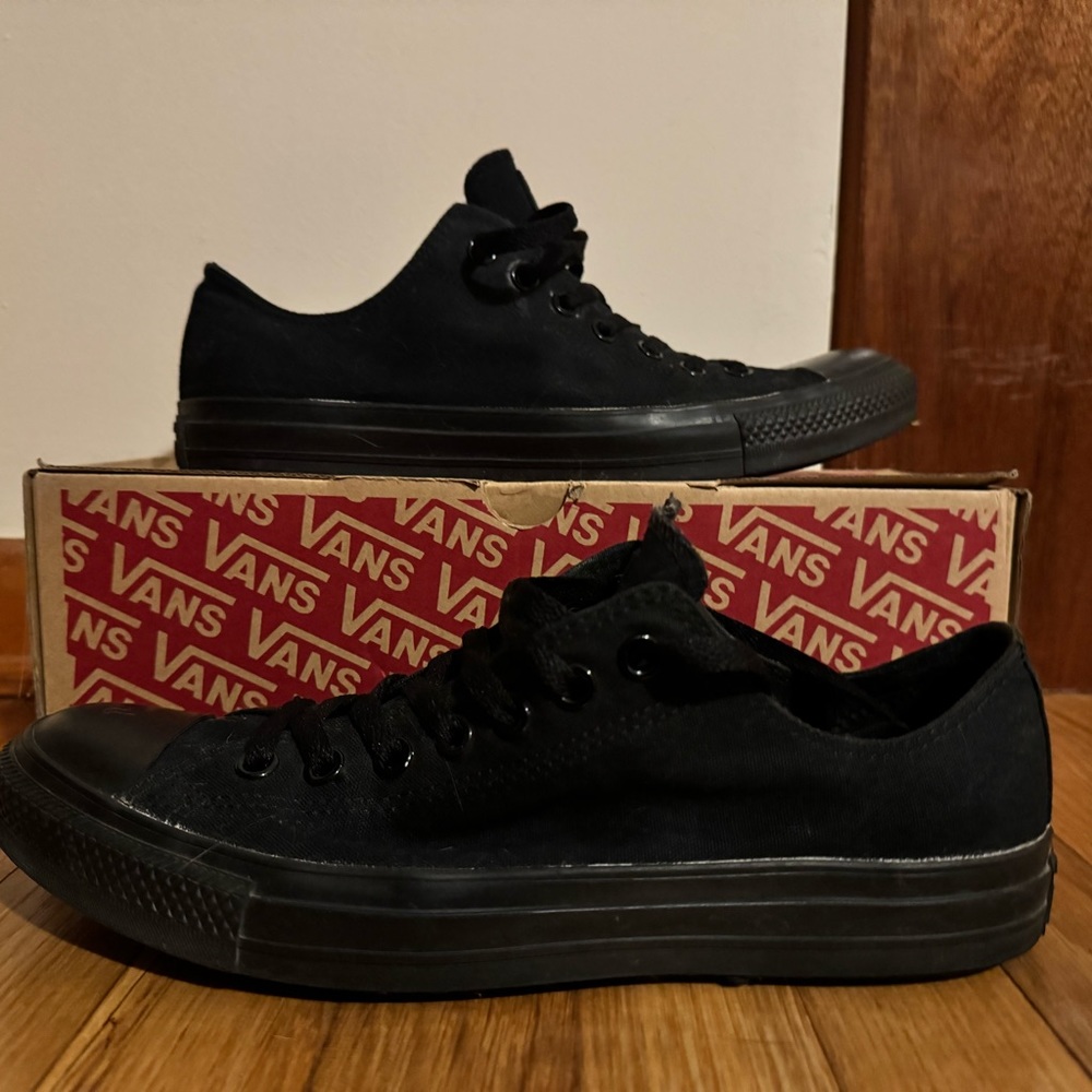 All black converse worn once and put away.
